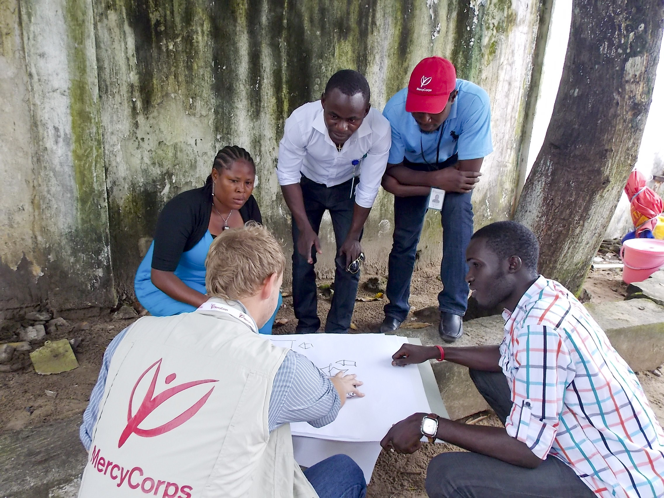 2014 Monrovia, Liberia. An image from the Mercy Corps response to the Ebola virus. Activities are focused on community education and prevention.  Pictured is Christopher Maclay.