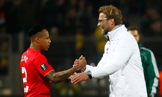 Klopp talking to Nathaniel Cyne during the action in Germany