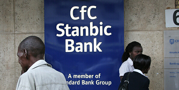 Passerby pass past a logo of CFC Stanbic bank on the 10th February 2009.Liz Muthoni
