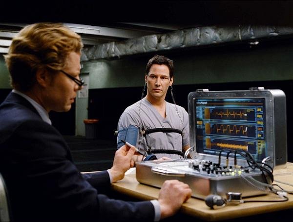 Klaatu (Keanu Reeves) prepares to turn the tables on a polygraph operator (David Richmond-Peck), as the alien begins his mission on Earth.
